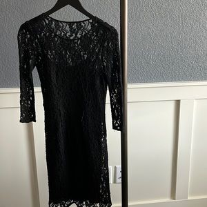 Lace overlay dress with black slip